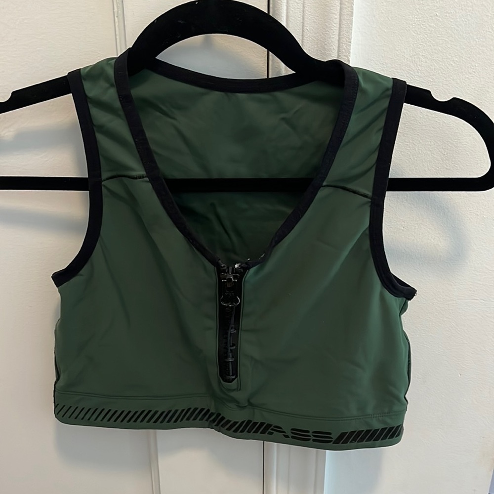 in good condition with some wear and tear around the zipper.